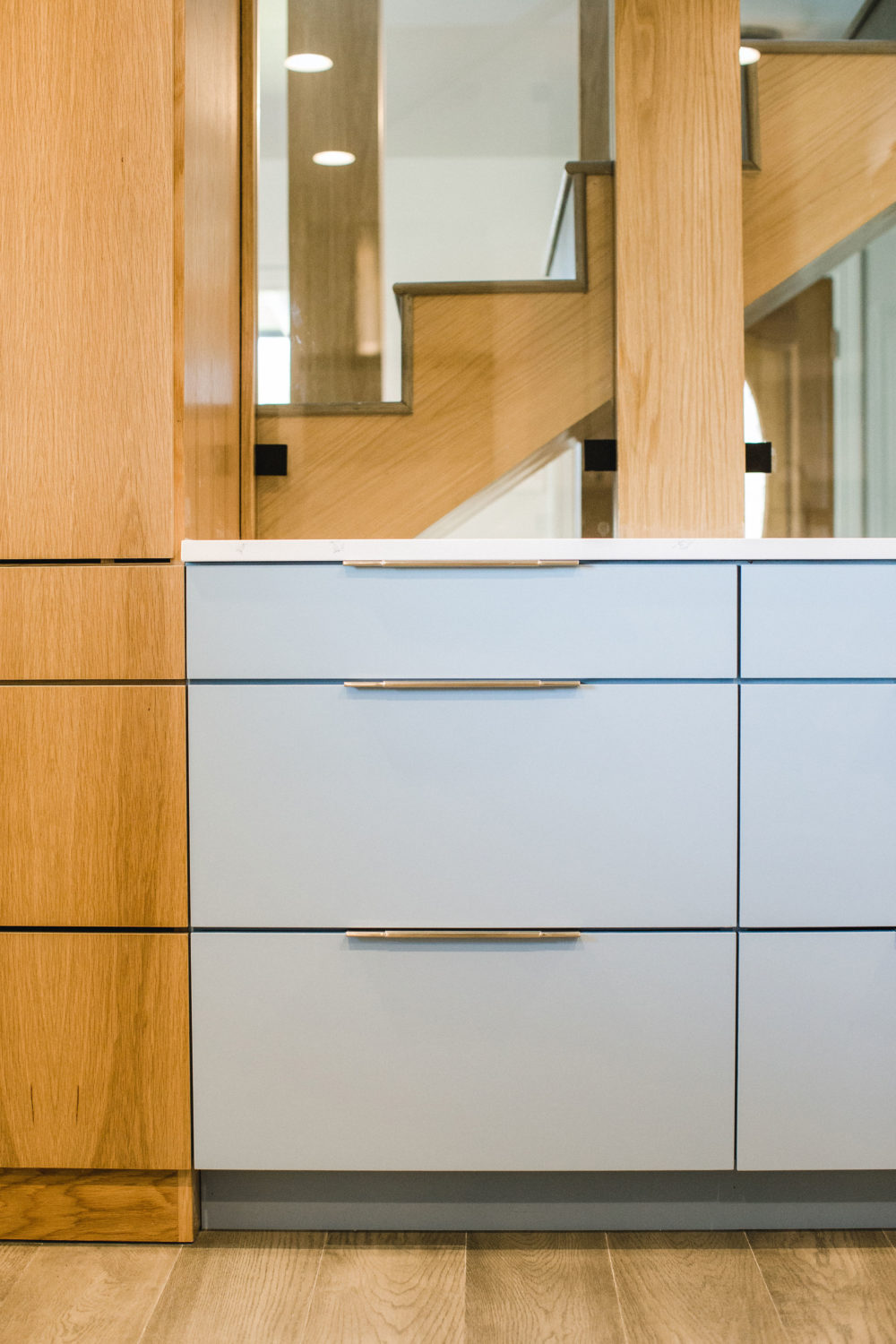 Hide Your Appliances with Custom Paneling & Garage Cabinets